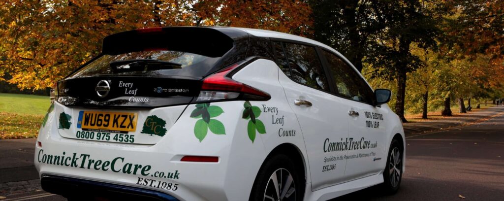 Car with Connick Tree Care branding