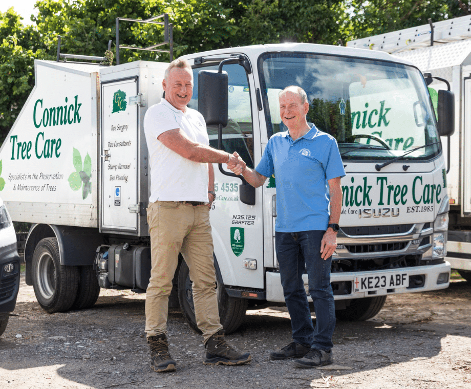 Dan Pennington and Mike Connick shaking hands