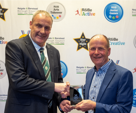Mike Connick presenting Volunteer of the Year award to winner, Tony Stone of Chipstead Football Club