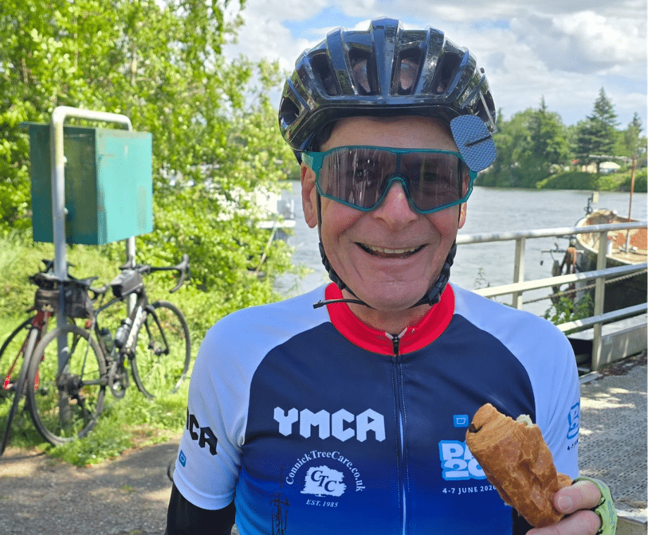 Mike enjoying a croissant: Mike Connick Cycles to Paris to Support YMCA East Surrey